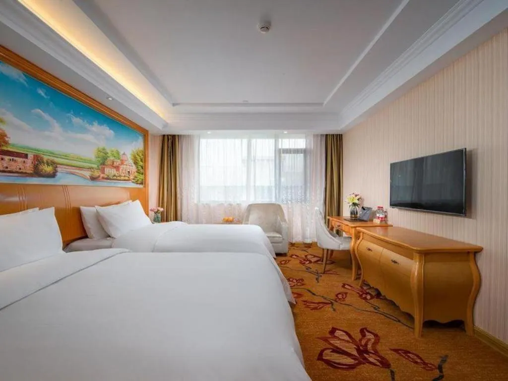 Bed in Vienna Hotel Tianjin 5th Avenue Youyi Road Cultural Center Metro Station