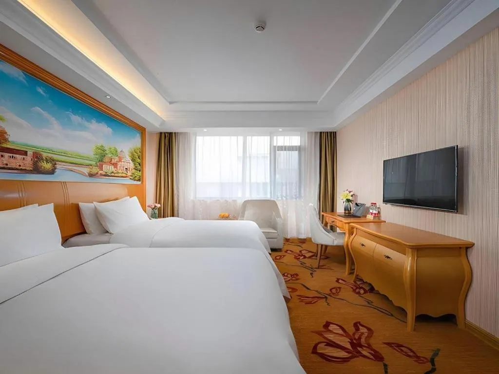Bed in Vienna Hotel Tianjin 5th Avenue Youyi Road Cultural Center Metro Station