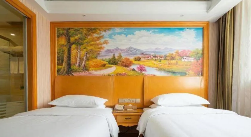 Bed in Vienna Hotel Tianjin 5th Avenue Youyi Road Cultural Center Metro Station