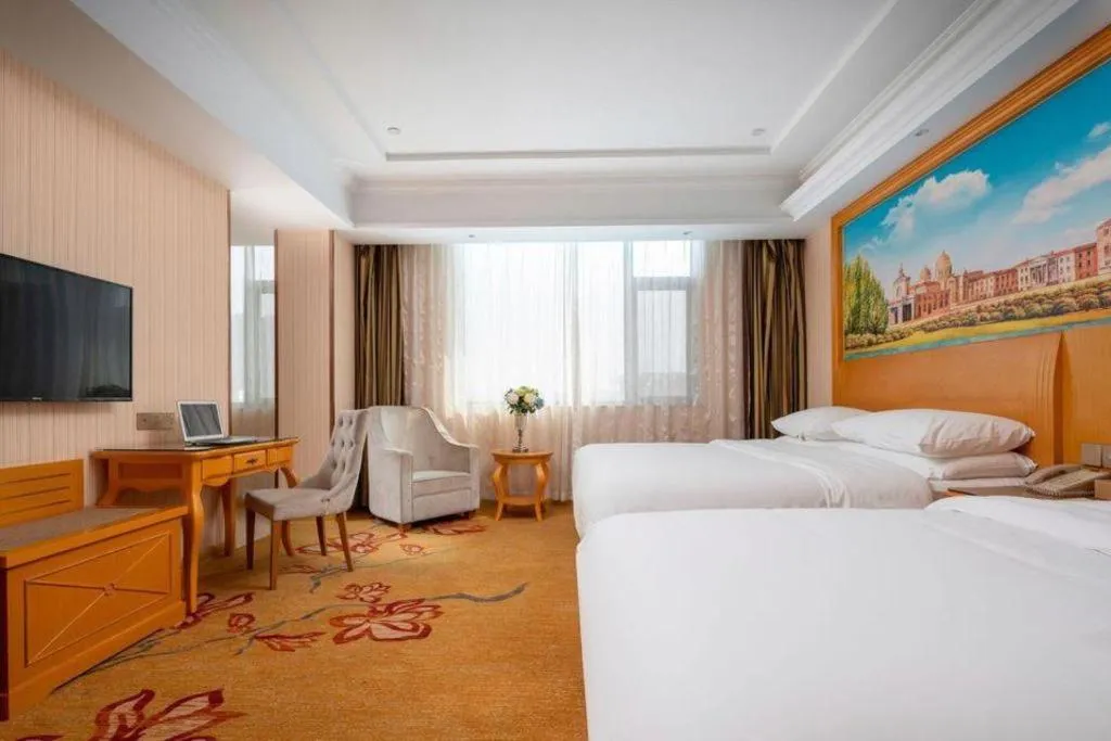 Bed in Vienna Hotel Tianjin 5th Avenue Youyi Road Cultural Center Metro Station