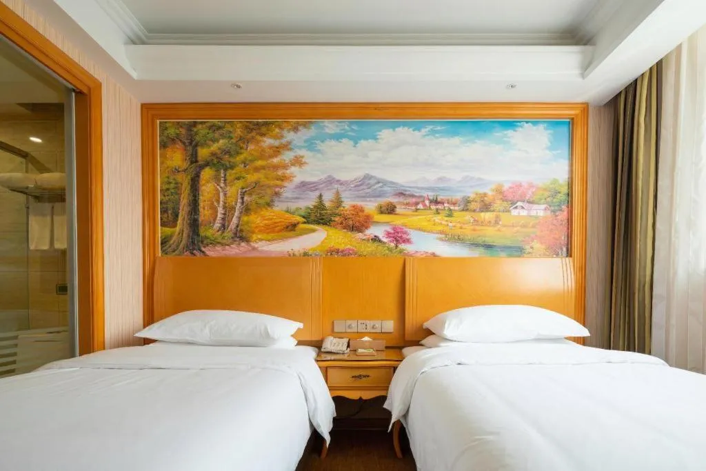 Bed in Vienna Hotel Tianjin 5th Avenue Youyi Road Cultural Center Metro Station