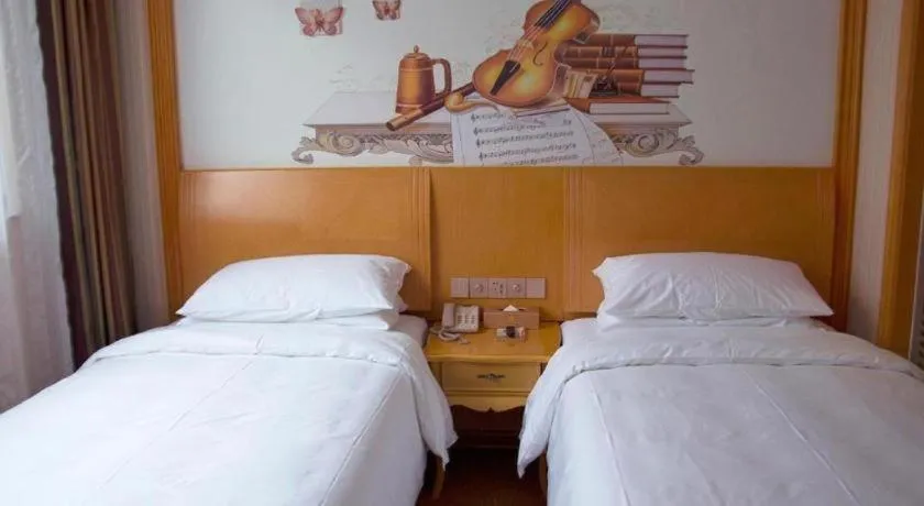 Bed in Vienna Hotel Tianjin 5th Avenue Youyi Road Cultural Center Metro Station