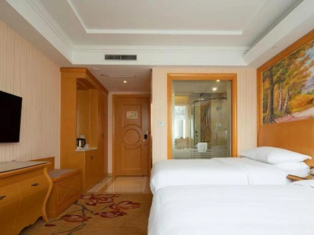 Bed in Vienna Hotel Tianjin 5th Avenue Youyi Road Cultural Center Metro Station