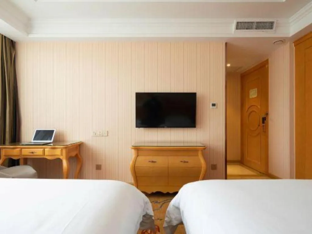 Bed in Vienna Hotel Tianjin 5th Avenue Youyi Road Cultural Center Metro Station