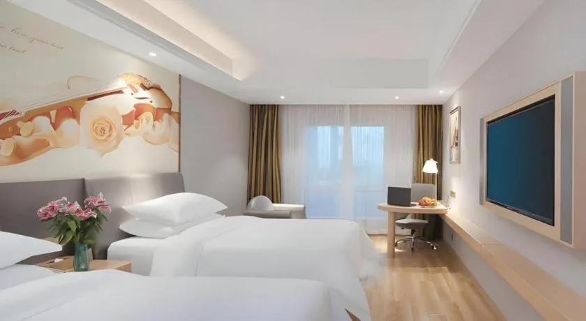 Bed in Vienna Hotel Shanghai Hongqiao Hub National Exhibition Center Huqingping Road