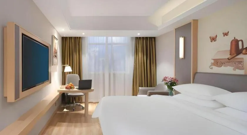 Bed in Vienna Hotel Shanghai Hongqiao Hub National Exhibition Center Huqingping Road