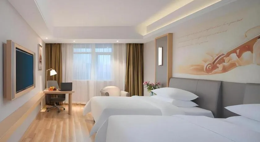 Bed in Vienna Hotel Shanghai Hongqiao Hub National Exhibition Center Huqingping Road