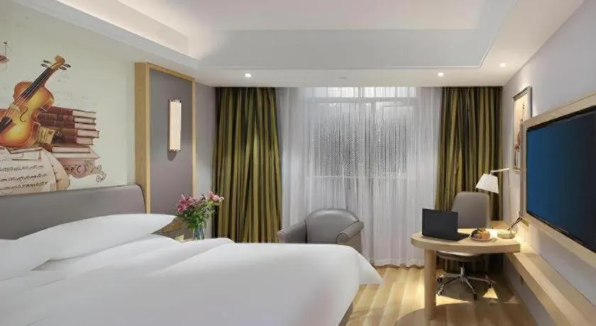 Bed in Vienna Hotel Shanghai Hongqiao Hub National Exhibition Center Huqingping Road
