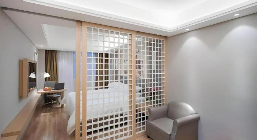 Bed in Vienna Hotel Shanghai Hongqiao Hub National Exhibition Center Huqingping Road