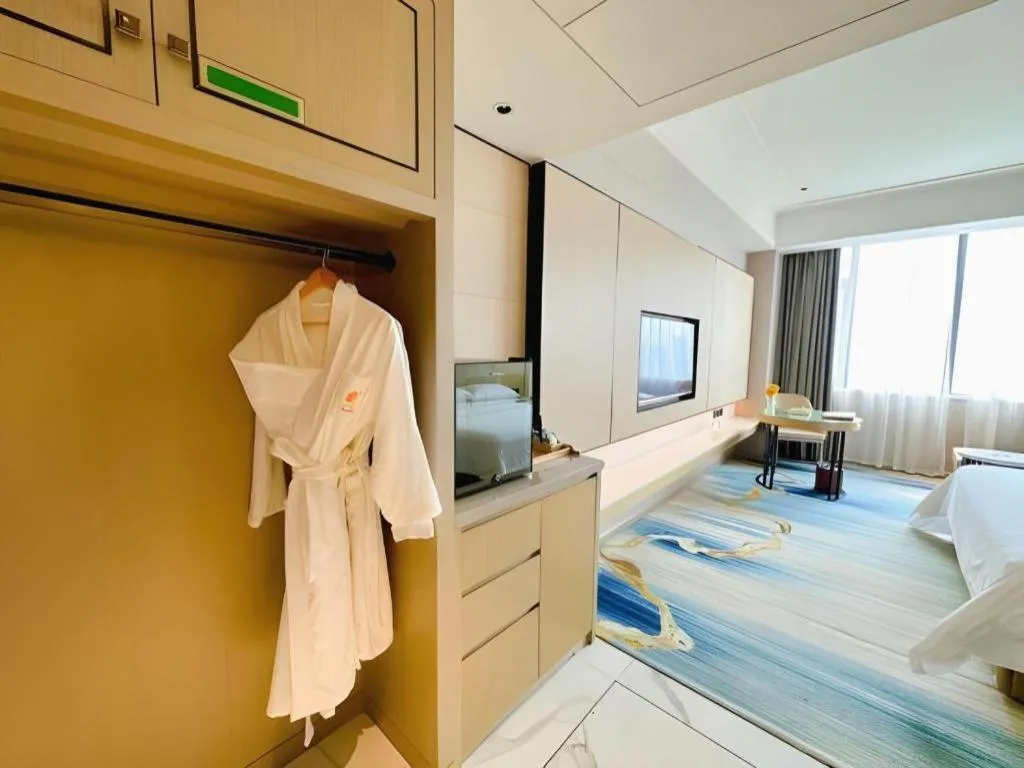 Bed in Venus Royal Hotel Guangdong Zhongshan Dongfeng Center