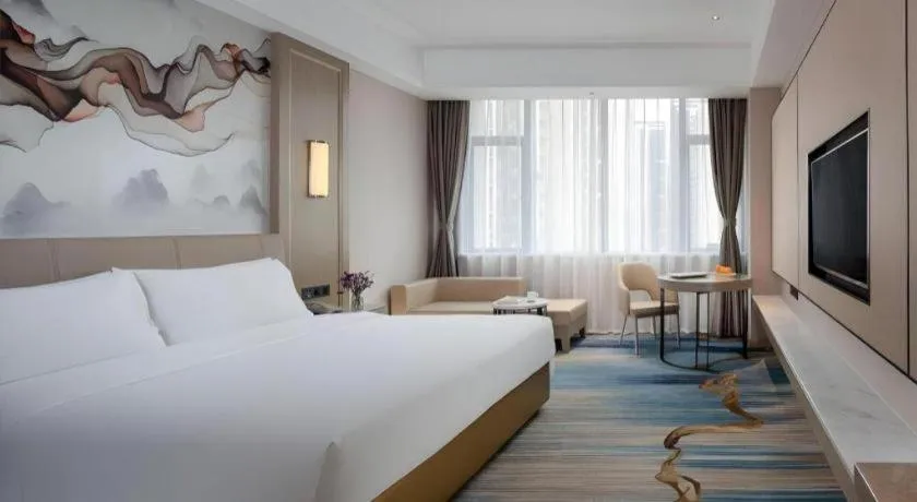 Bed in Venus Royal Hotel Guangdong Zhongshan Dongfeng Center