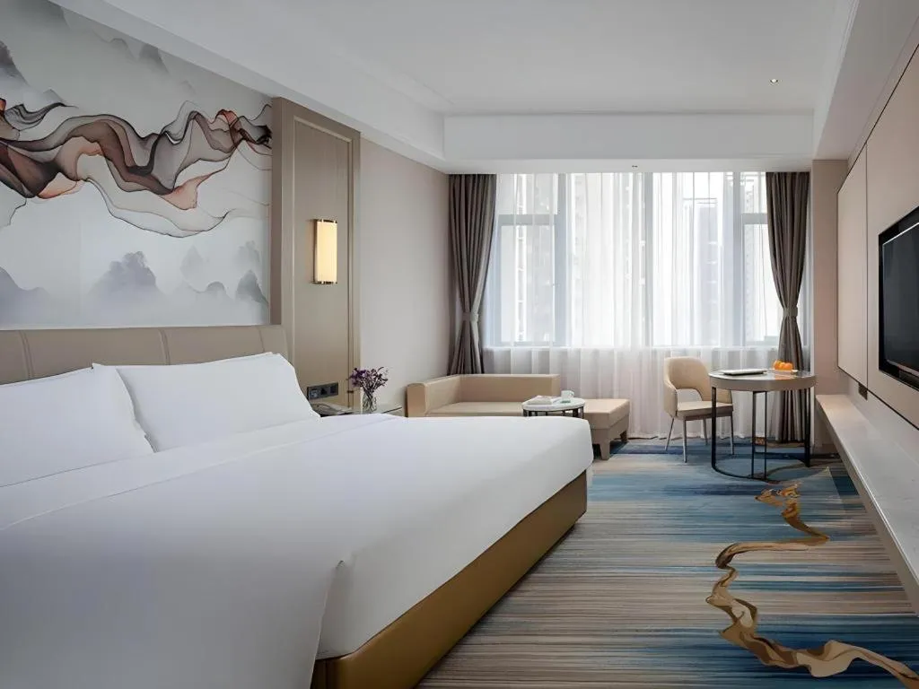 Bed in Venus Royal Hotel Guangdong Zhongshan Dongfeng Center