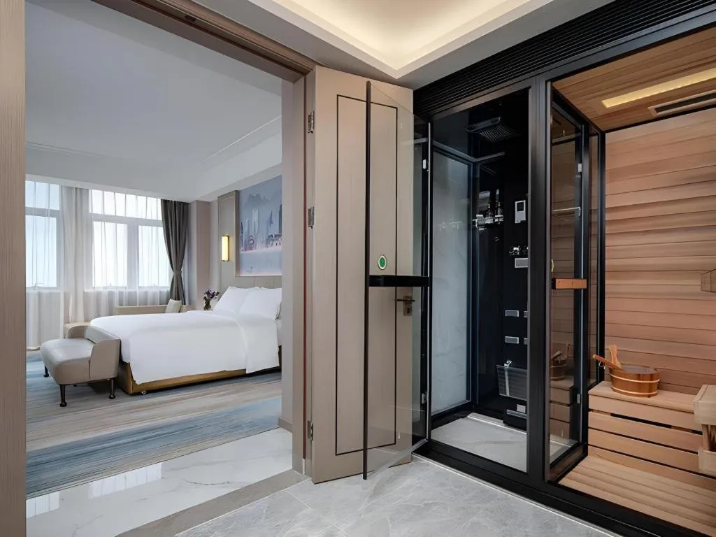 Bed in Venus Royal Hotel Guangdong Zhongshan Dongfeng Center