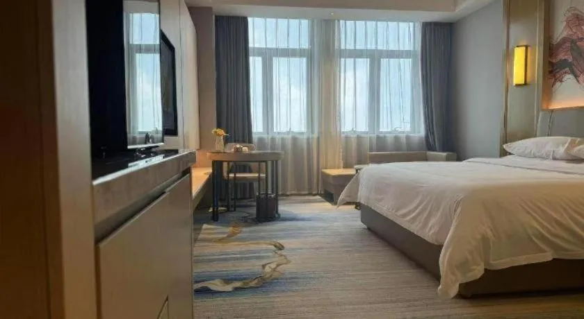 Bed in Venus Royal Hotel Guangdong Zhongshan Dongfeng Center