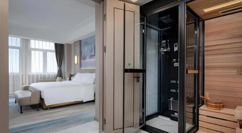 Bed in Venus Royal Hotel Guangdong Zhongshan Dongfeng Center