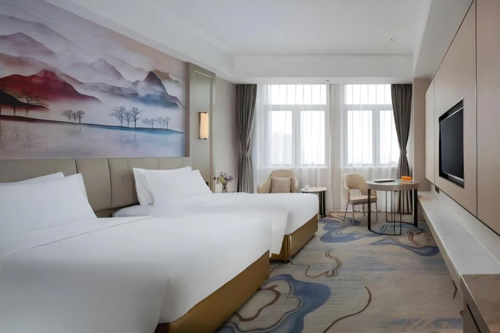 Bed in Venus Royal Hotel Guangdong Zhongshan Dongfeng Center