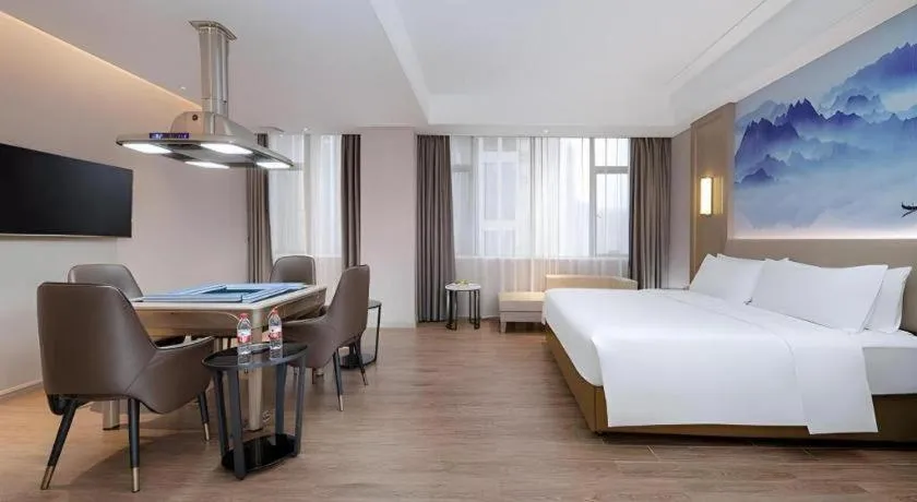 Bed in Venus Royal Hotel Guangdong Zhongshan Dongfeng Center