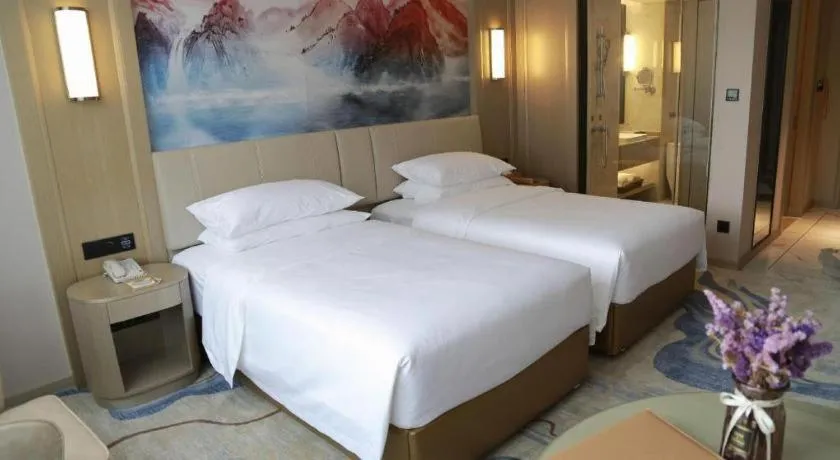 Bed in Venus Royal Hotel Guangdong Zhongshan Dongfeng Center