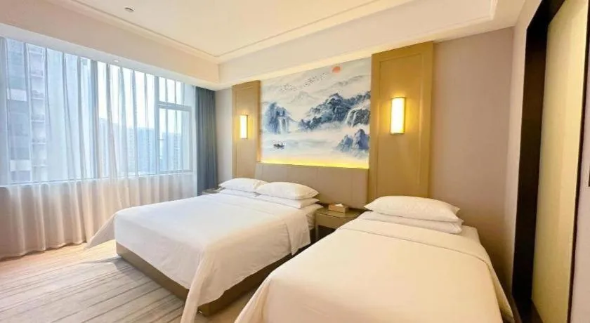 Bed in Venus Royal Hotel Guangdong Zhongshan Dongfeng Center