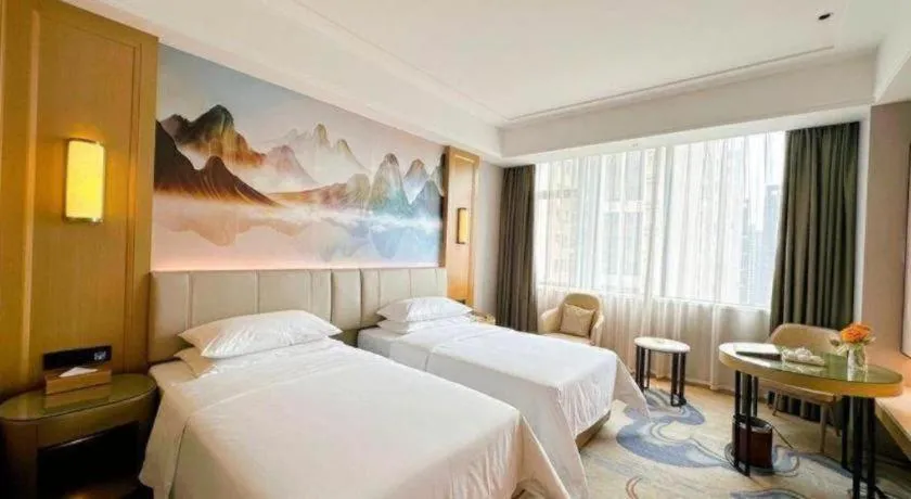 Bed in Venus Royal Hotel Guangdong Zhongshan Dongfeng Center