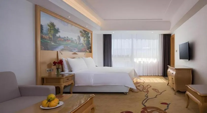 Bed in Vienna Hotel Guangdong Huizhou Huabianling Square