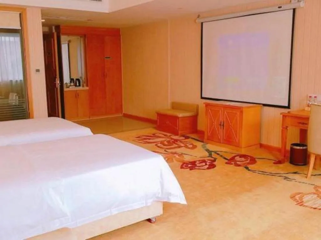 Bed in Vienna Hotel Guangxi Yulin Rong County Guinan Road