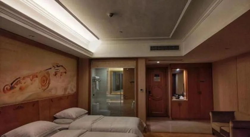 Bed in Vienna Hotel Guangxi Yulin Rong County Guinan Road