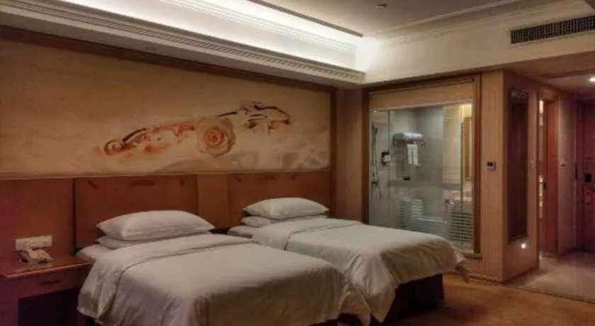 Bed in Vienna Hotel Guangxi Yulin Rong County Guinan Road