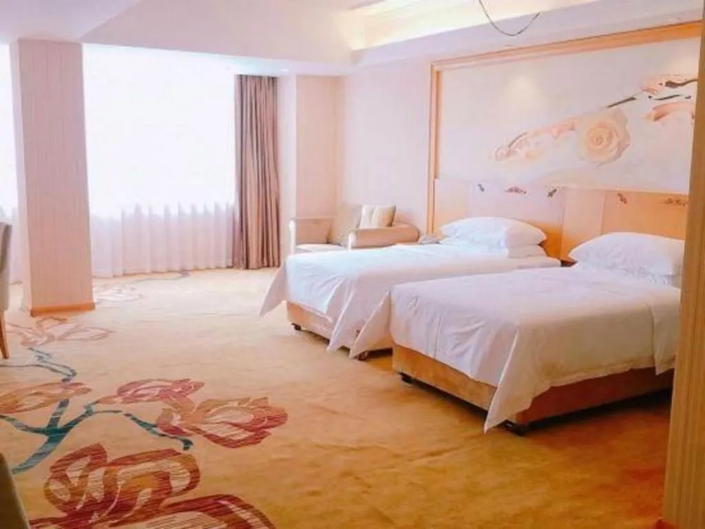 Bed in Vienna Hotel Guangxi Yulin Rong County Guinan Road