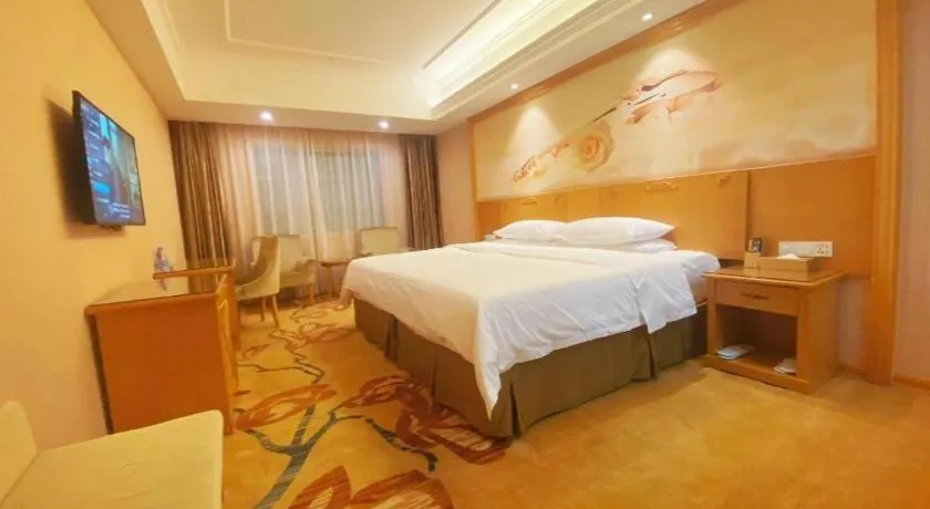 Bed in Vienna Hotel Guangxi Yulin Rong County Guinan Road