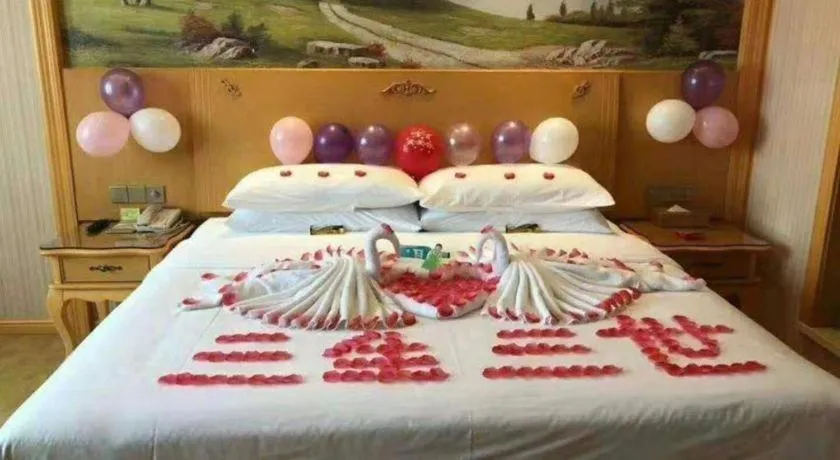 Bed in Vienna Hotel Guangxi Yulin Rong County Guinan Road