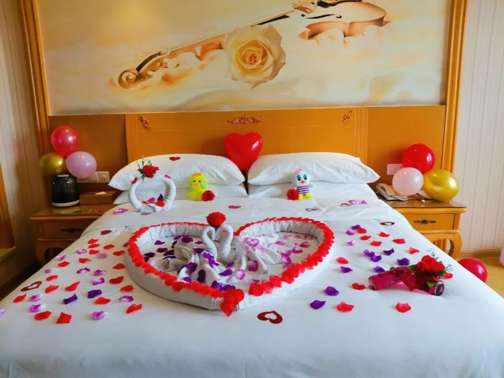 Bed in Vienna Hotel Guangxi Yulin Rong County Guinan Road