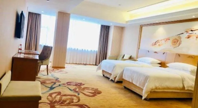 Bed in Vienna Hotel Guangxi Yulin Rong County Guinan Road