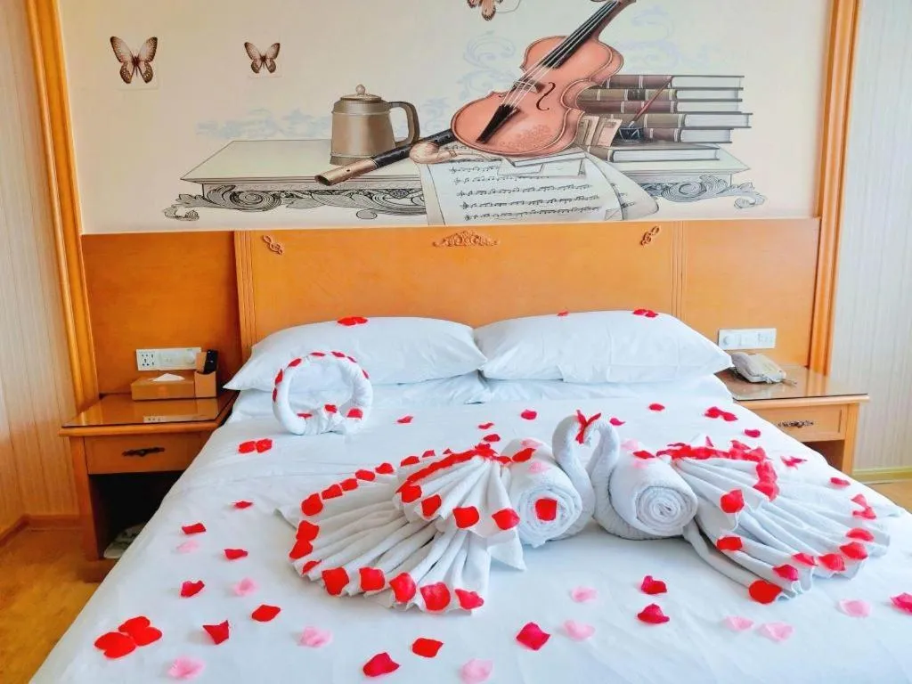 Bed in Vienna Hotel Guangxi Yulin Rong County Guinan Road