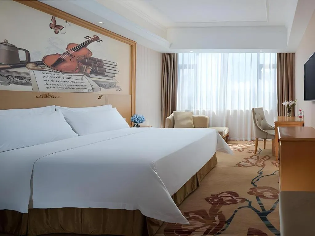 Bed in Vienna Hotel Guangxi Yulin Rong County Guinan Road