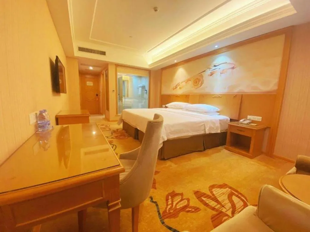 Bed in Vienna Hotel Guangxi Yulin Rong County Guinan Road