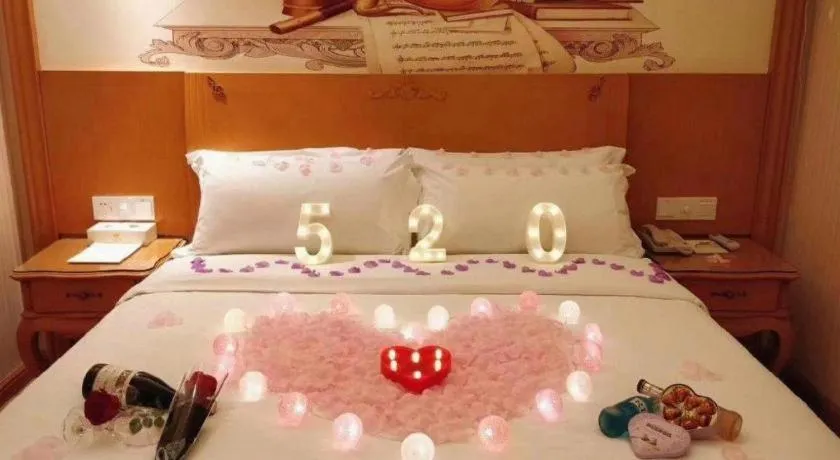 Bed in Vienna Hotel Guangxi Yulin Rong County Guinan Road