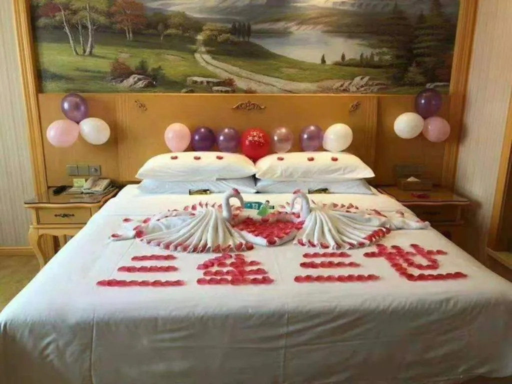 Bed in Vienna Hotel Guangxi Yulin Rong County Guinan Road