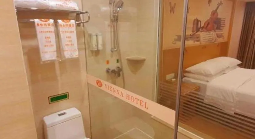 Bed in Vienna Hotel Guangxi Yulin Rong County Guinan Road