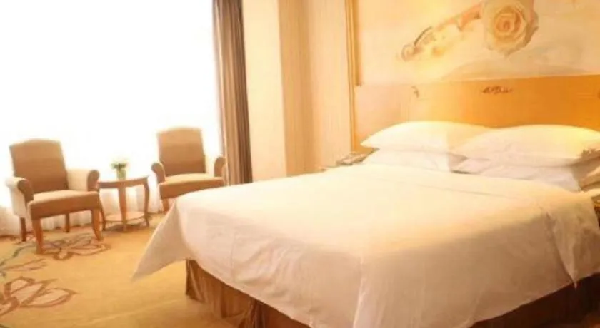 Bed in Vienna Hotel Guangxi Yulin Rong County Guinan Road
