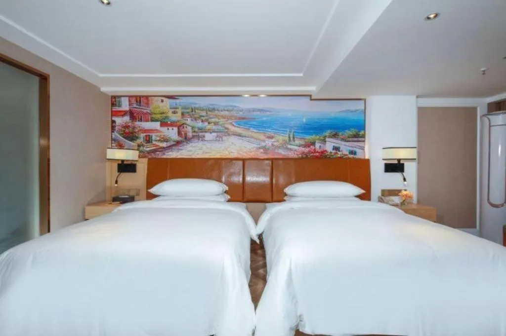 Bed in Vienna Hotel Chengdu Exhibition Center In Time City