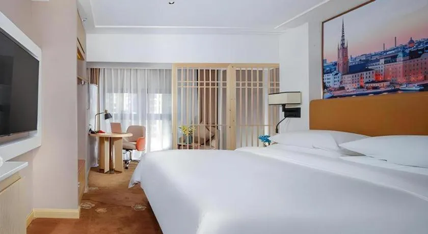 Bed in Vienna Hotel Chengdu Exhibition Center In Time City