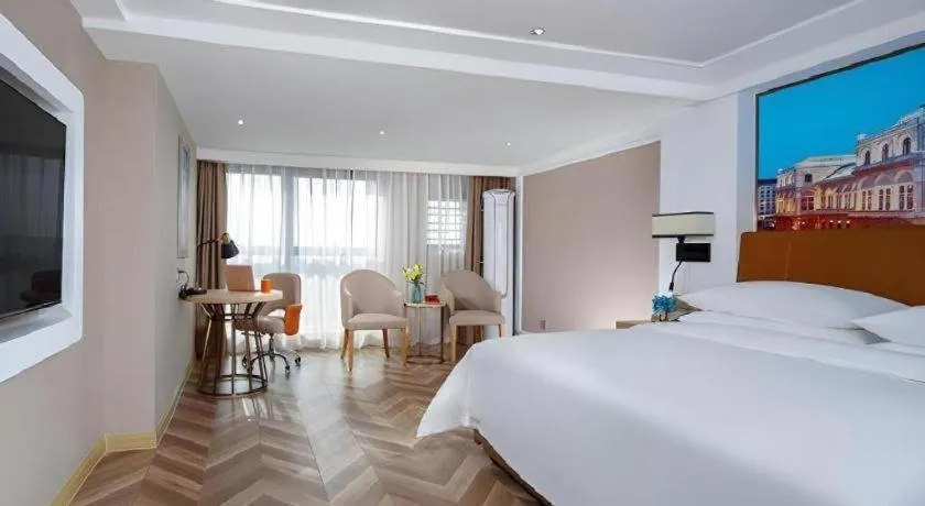 Bed in Vienna Hotel Chengdu Exhibition Center In Time City