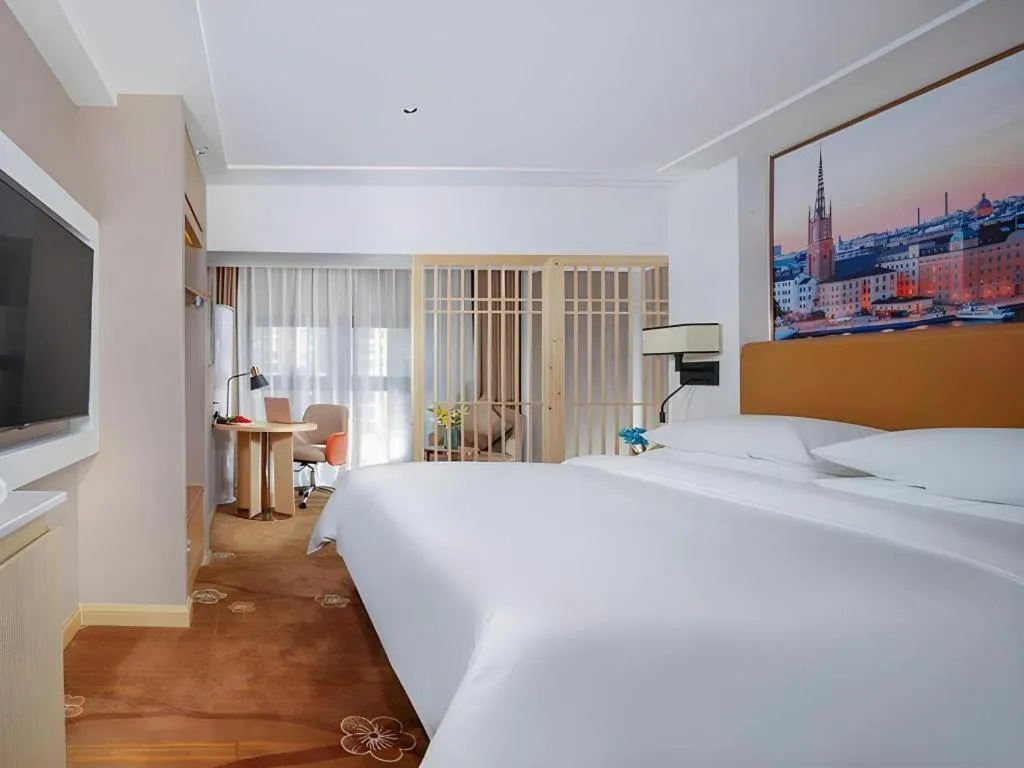 Bed in Vienna Hotel Chengdu Exhibition Center In Time City