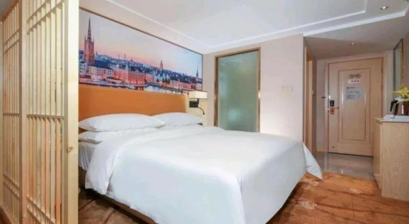 Bed in Vienna Hotel Chengdu Exhibition Center In Time City