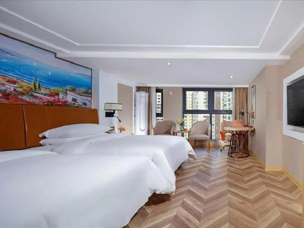 Bed in Vienna Hotel Chengdu Exhibition Center In Time City