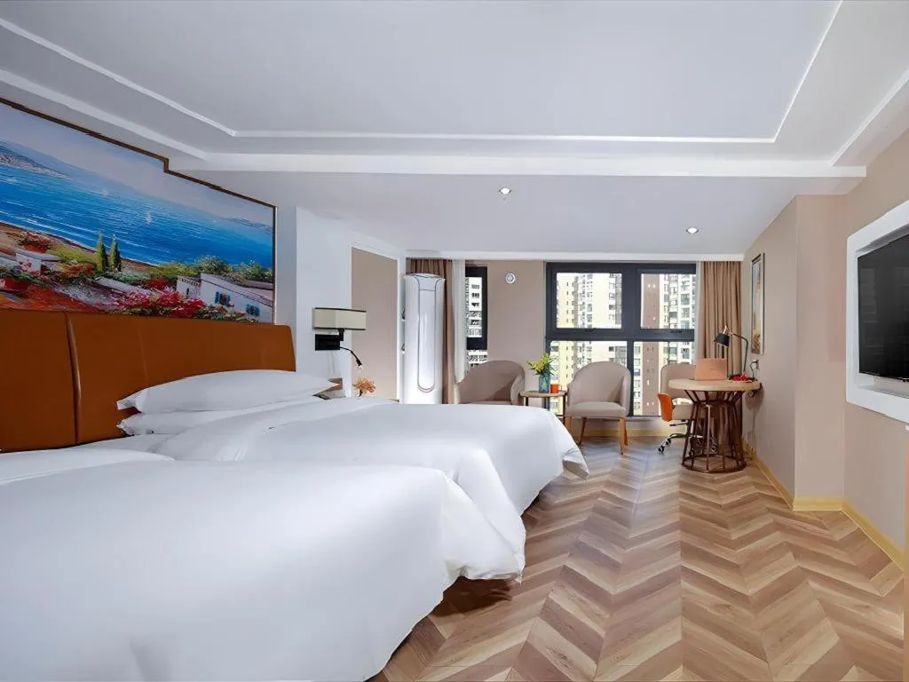 Bed in Vienna Hotel Chengdu Exhibition Center In Time City