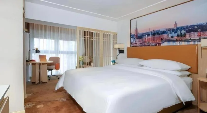 Bed in Vienna Hotel Chengdu Exhibition Center In Time City