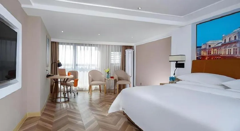 Bed in Vienna Hotel Chengdu Exhibition Center In Time City