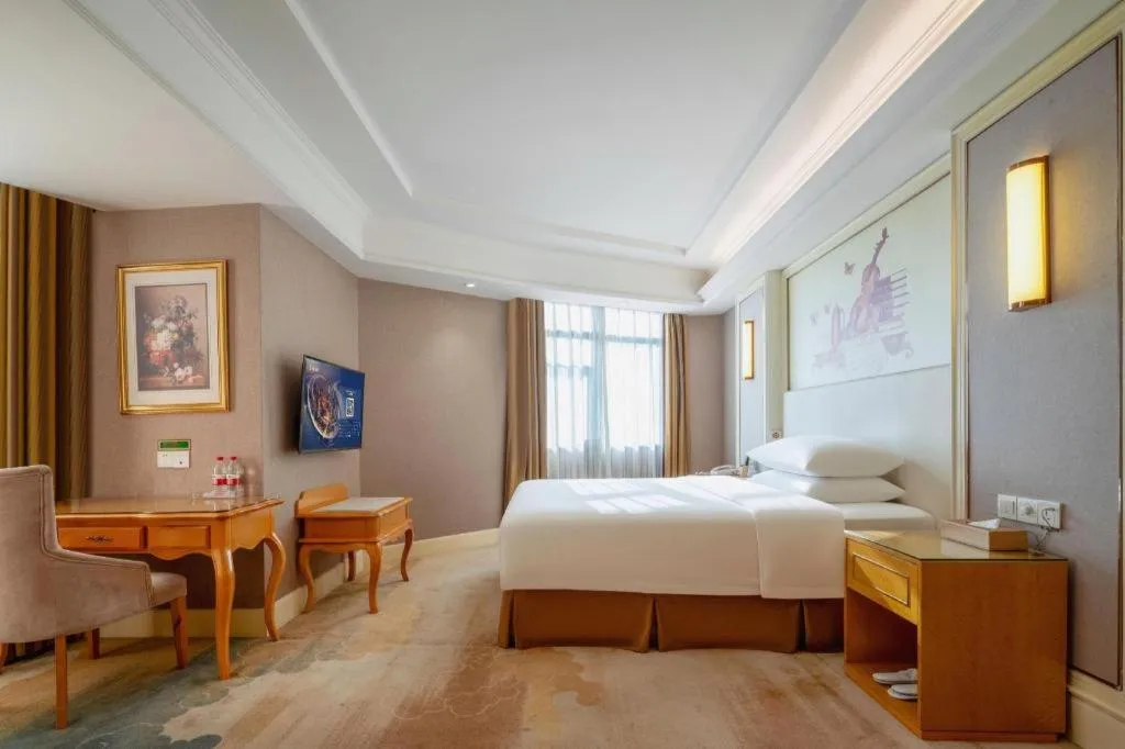Bed in Vienna Hotel Shenzhen Pingdi Huancheng South Road